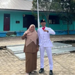 M. Nizam Ketua Kelas X3 Ikut Barisan Penggeret Bendera pada Upacara Kesaktian Pancasila dan HUT TNI